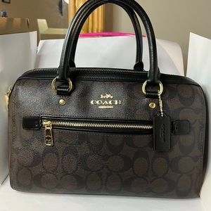 Brown and black Coach satchel